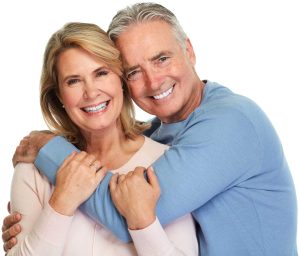 Senior couple hugging and smiling
